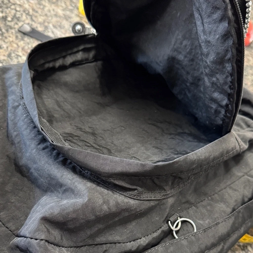 Kipling Hal Expandable Black Backpack with large Silver Accent zippers EUC